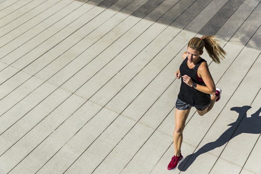 Heart rate running - Woman with heart rate monitor